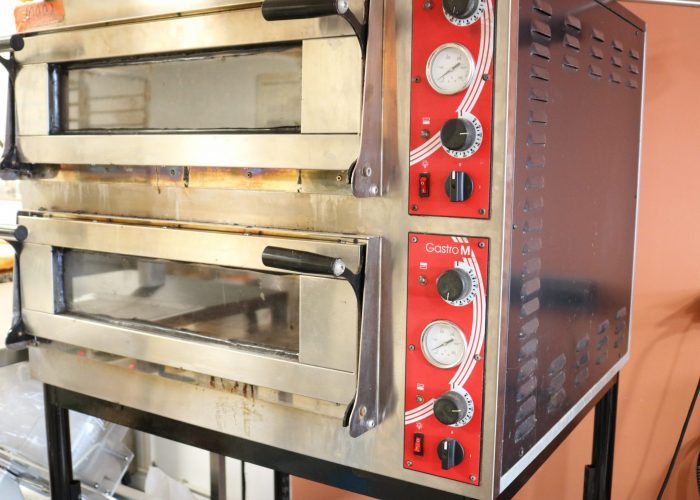 Four à pizza permettant la cuisson de nos pizzas faites-maison